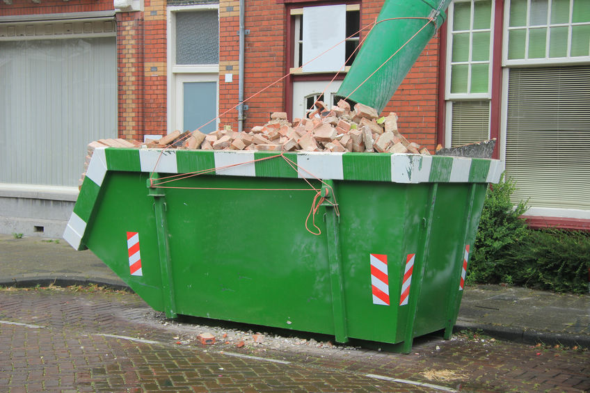 Loaded dumpster with clean trash chute 