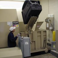 OLYMPUS DIGITAL CAMERA Self-Contained Trash Compactors by Action Compaction Equipment