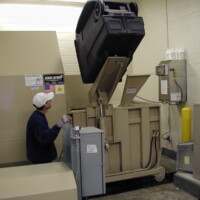 OLYMPUS DIGITAL CAMERA Self-Contained Trash Compactors by Action Compaction Equipment